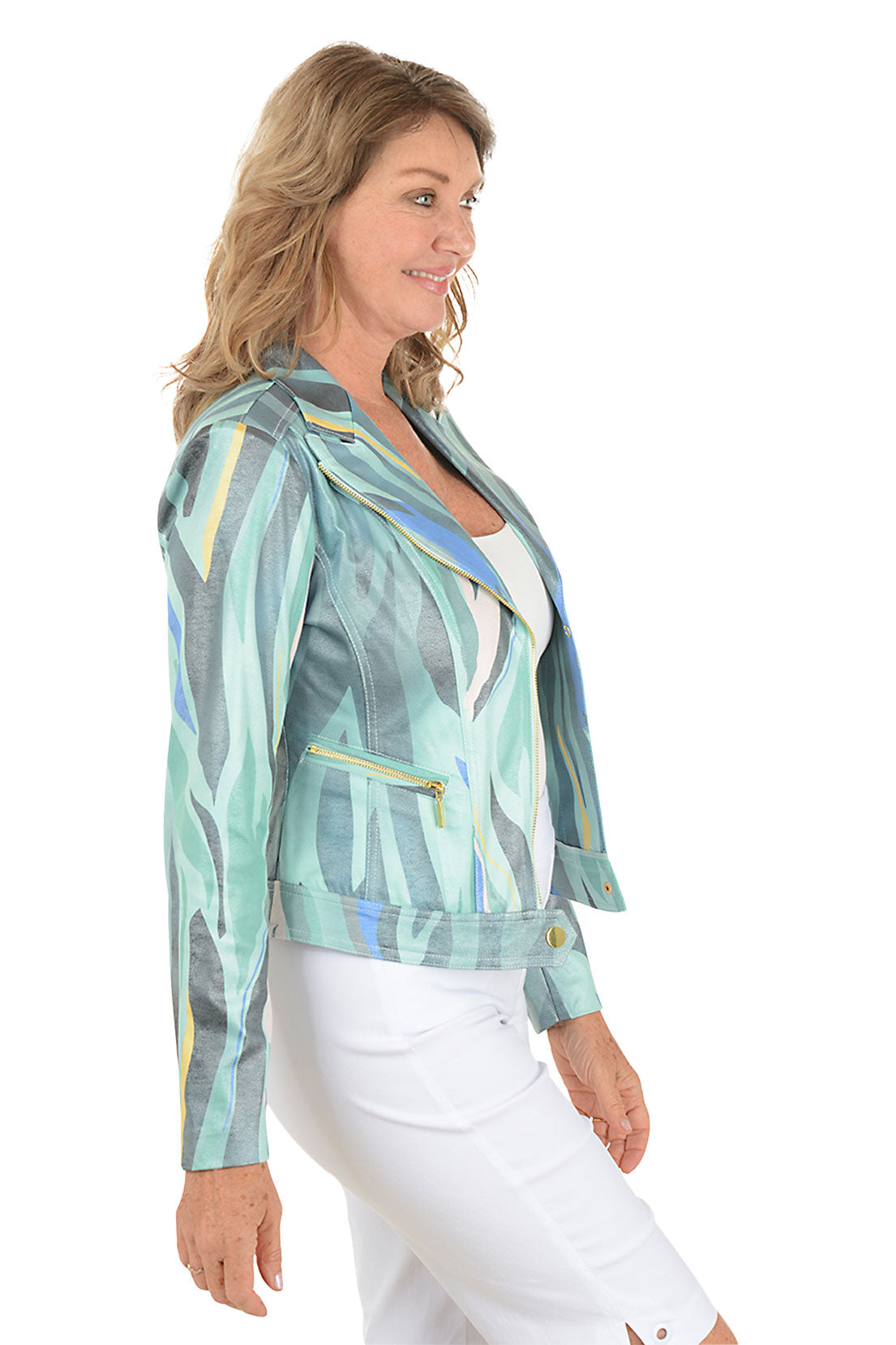 Woman wearing a colorful jacket with abstract patterns on a white background. Side shot.