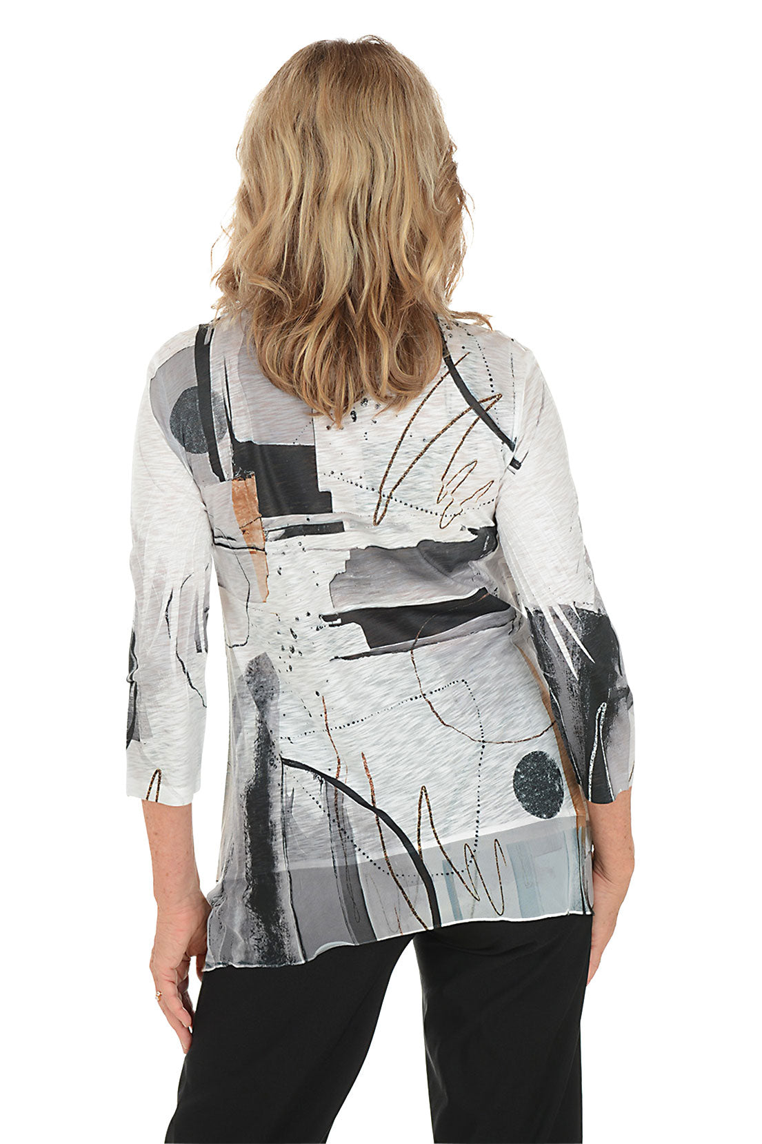 A woman wearing a 3/4 sleeve black and white shirt with an abstract pattern and flutter hem. Back shot.