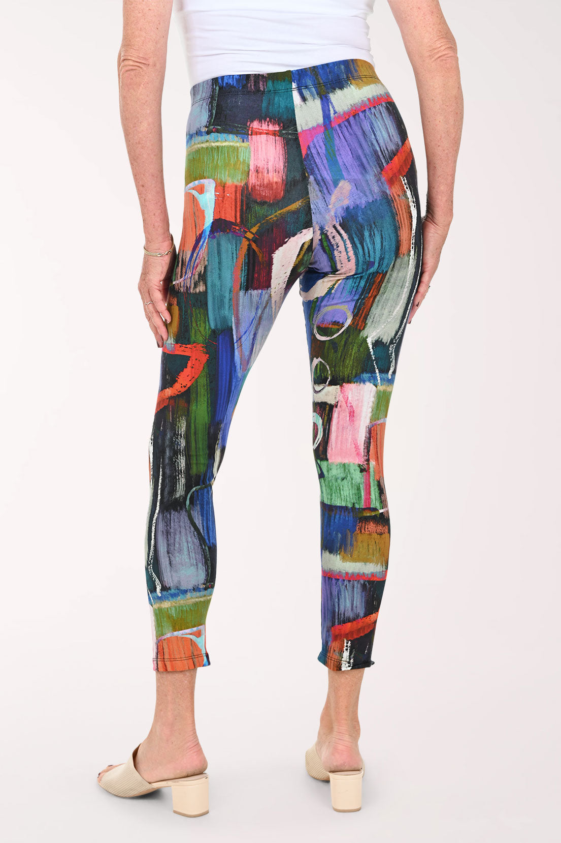 Woman wearing abstract printed leggings