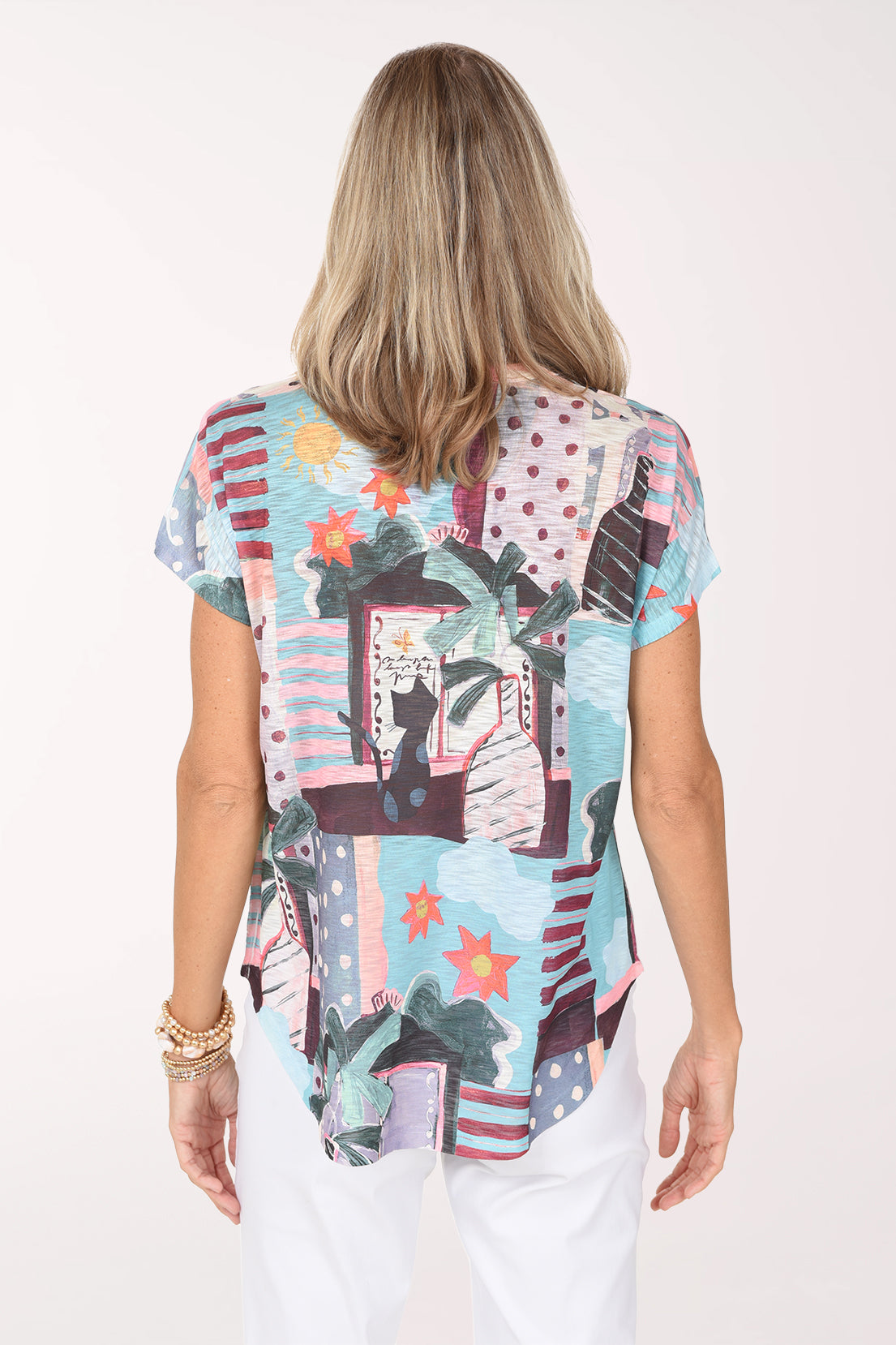 Back view of the Sunny Day Slub Knit Short Sleeve Top in pastel patchwork print