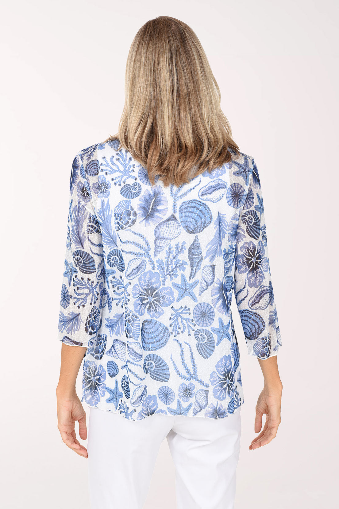 Back view of the Sally Mesh 3/4 Sleeve Top in blue seashell print