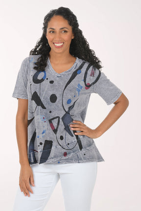 Woman wearing a patterned gray shirt on a white background