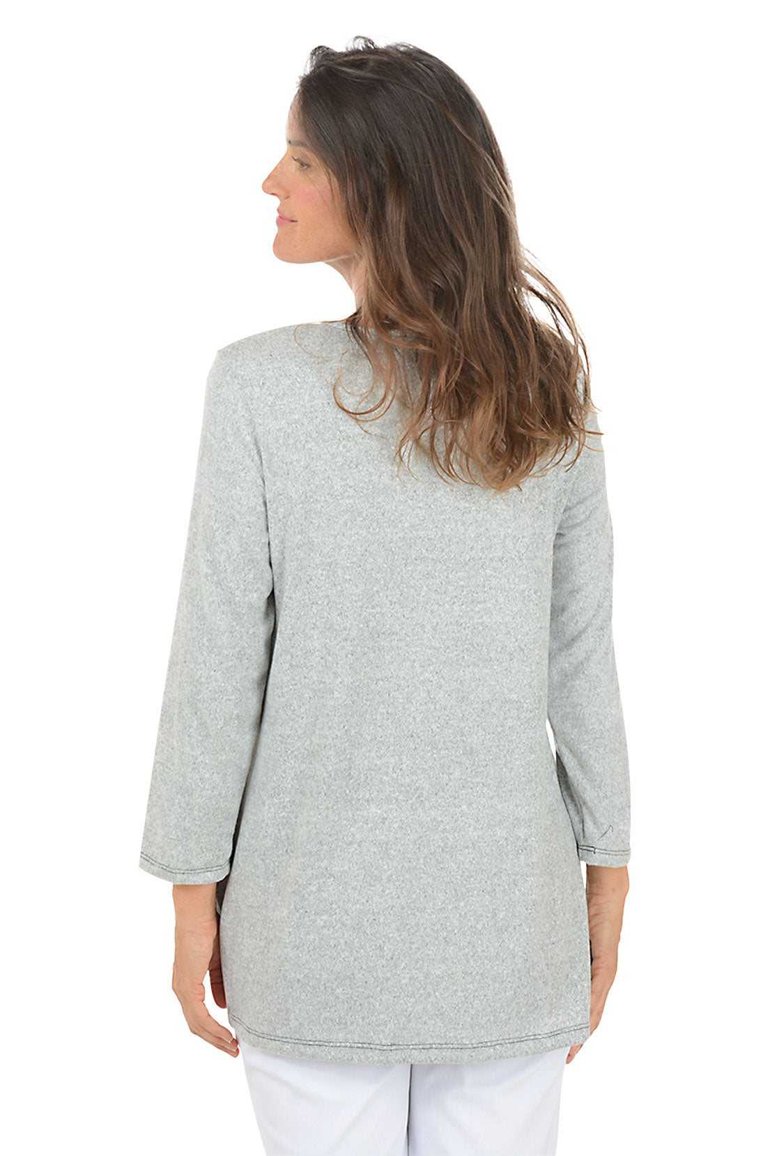 Woman wearing a gray sweater with a colorful butterfly design on a white background.  Back shot.