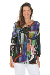 Woman wearing a colorful abstract patterned top on a white background.