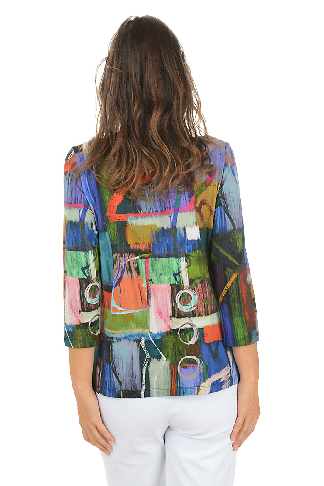 Woman wearing a colorful abstract patterned top on a white background. Back shot.