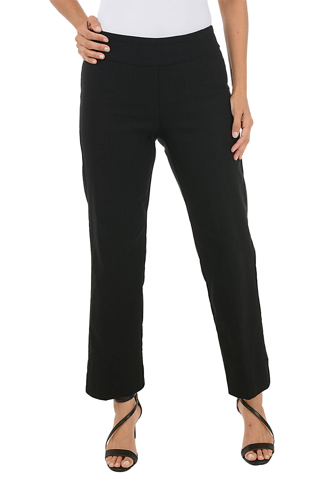 Black pants worn by a person on a white background
