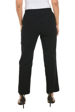 Black pants worn by a person on a white background. Back shot.