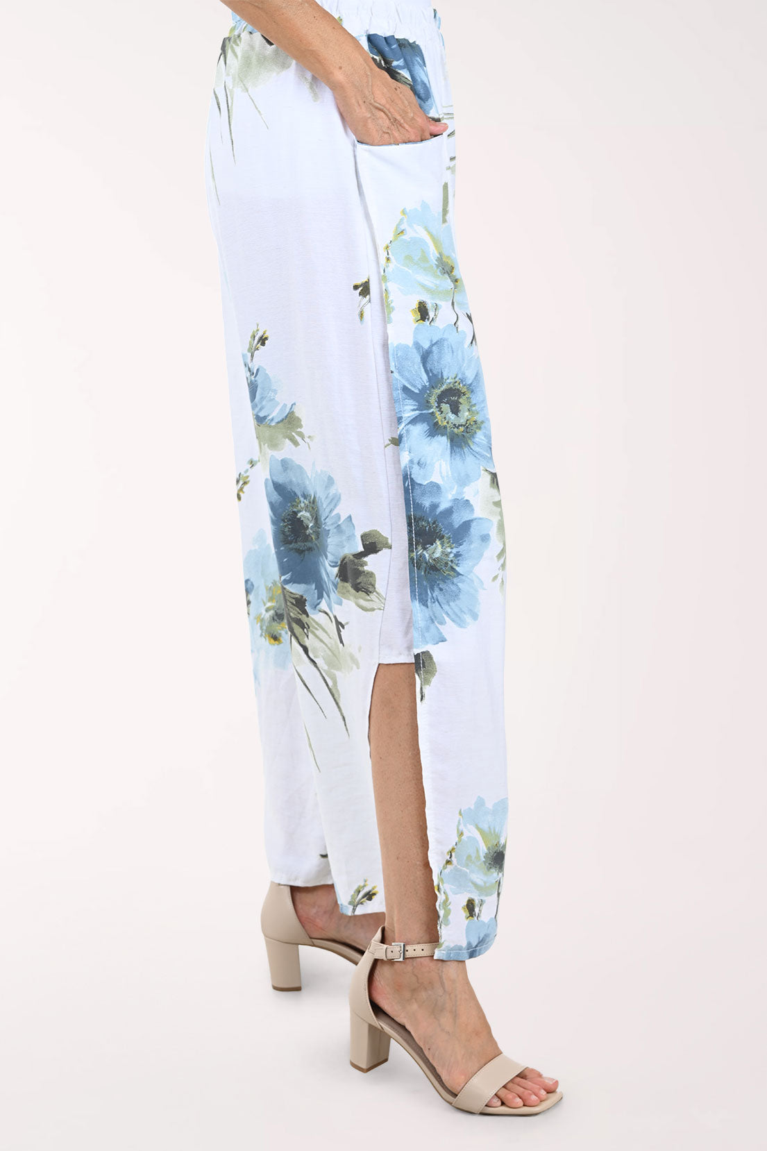 Floral-patterned pants with a white background
