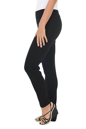 Black pants worn by a person on a white background