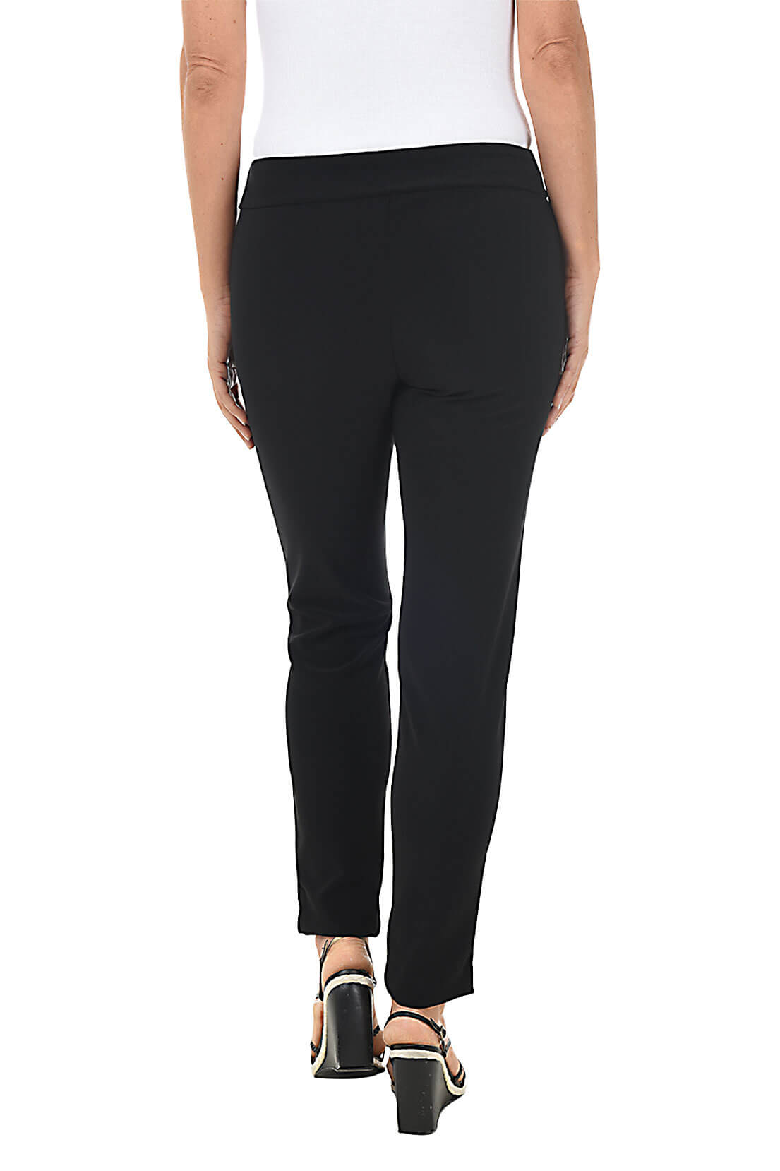 Back shot of model wearing black pants worn by a person on a white background