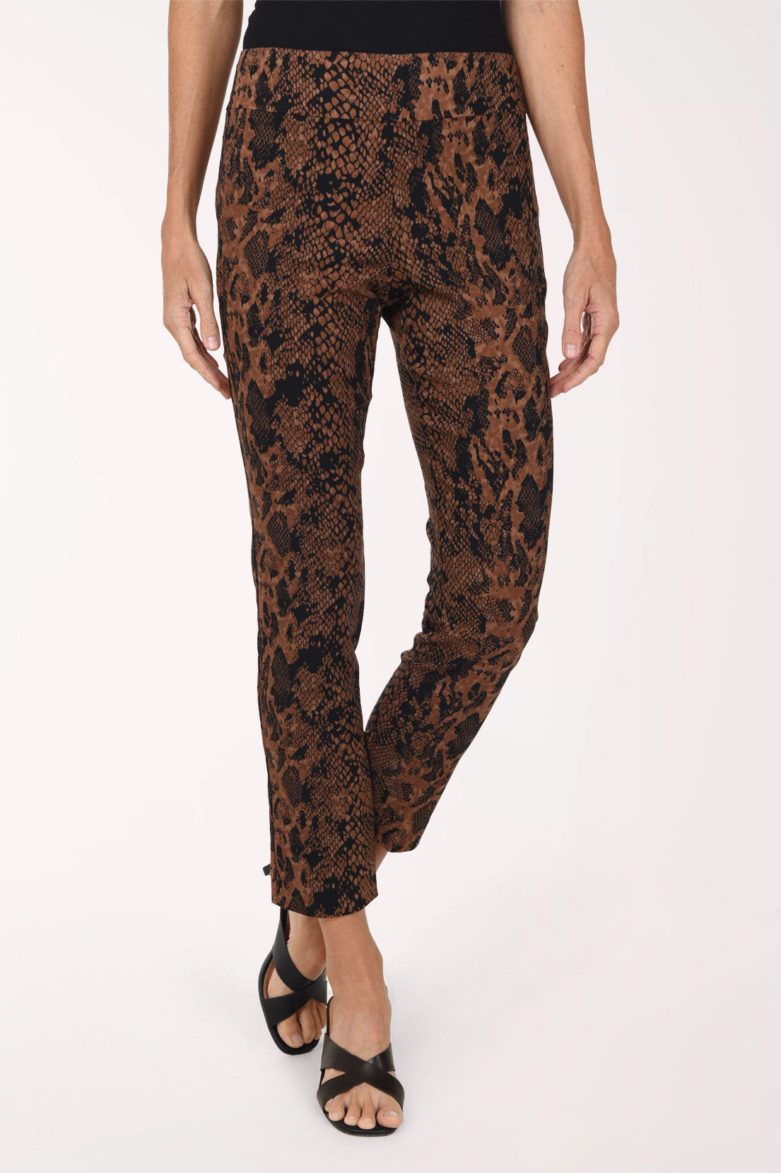 Women wearing brown python printed pull-on ankle pants