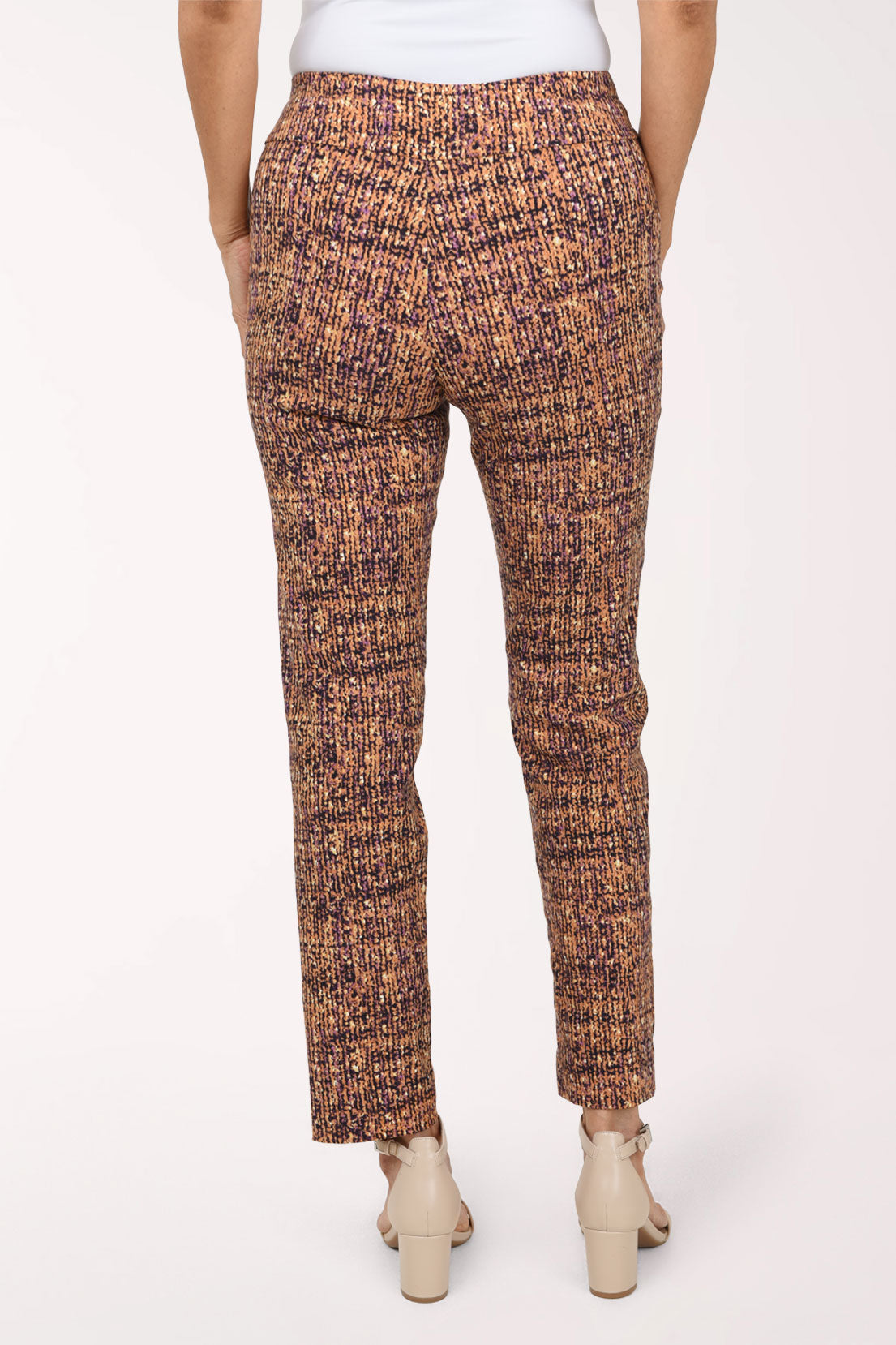 Women wearing a cashew brown pull-on ankle pant 