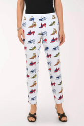 White pants with colorful high heel print worn by a person on a white background