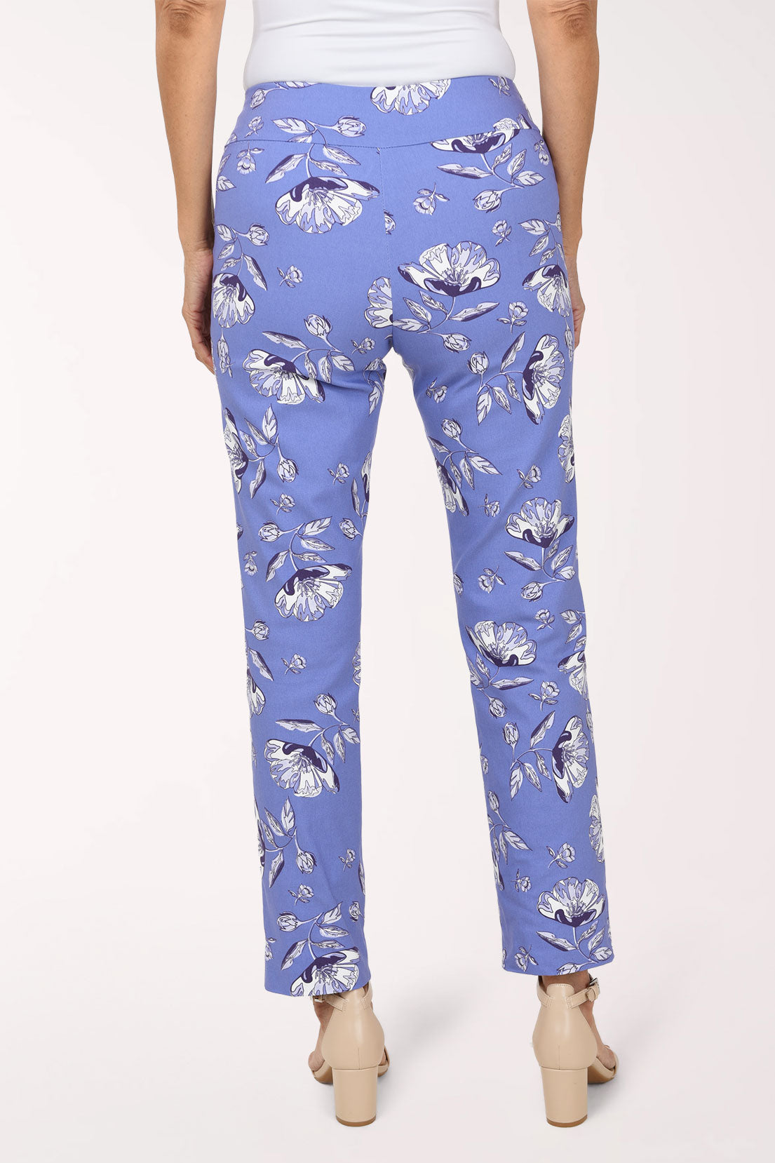 Women wearing a lilac blue pull-on ankle pant with white flowers