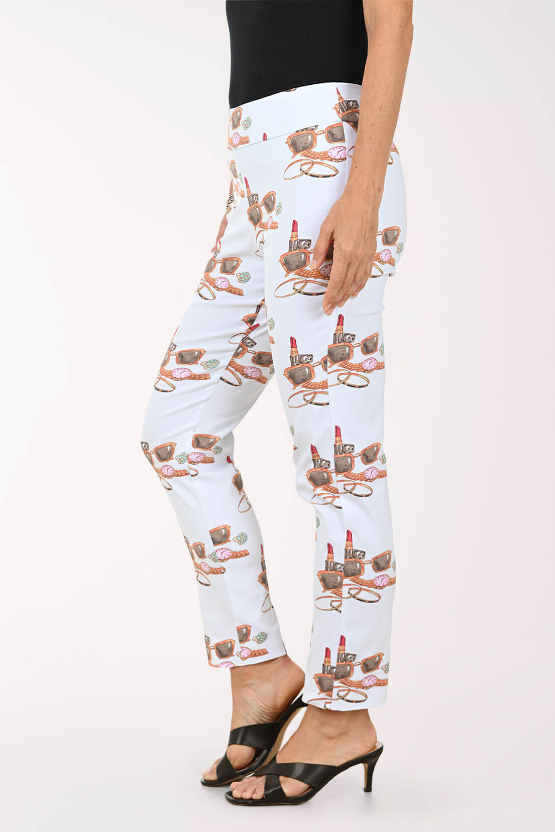 White pants with lipstick print worn by a person on a white background