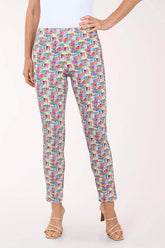 Multicolored patterned pants worn by a person on a white background