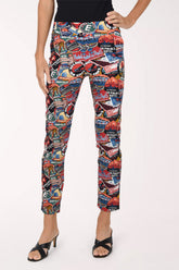 Women wearing an assorted passport print pull-on ankle pants