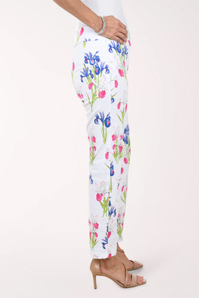Floral-patterned pants worn by a person on a white background