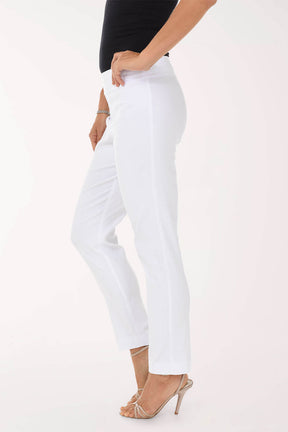 White pants worn by a person on a white background
