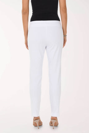 Person wearing white pants and a black top on a white background