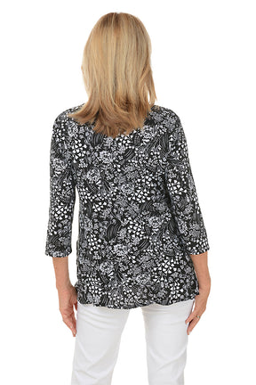 Wild Floral Ruffle Hem Knit Top