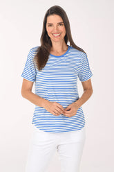 Woman wearing a blue and white striped shirt on a white background