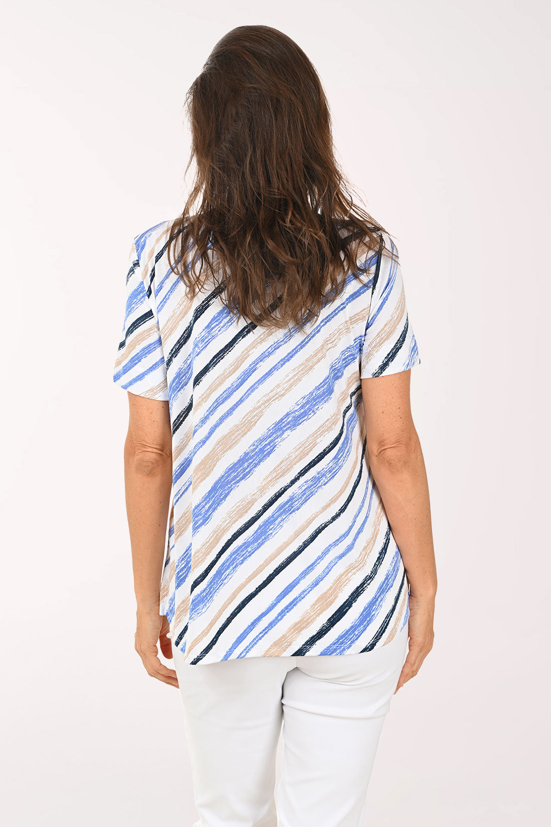 Woman wearing a striped shirt on a white background