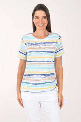 Woman wearing a colorful striped shirt on a white background