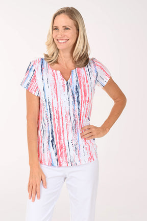 Woman wearing a colorful striped shirt on a white background