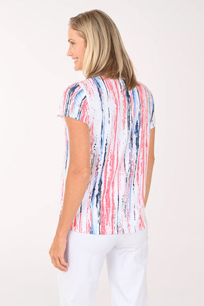 Woman wearing a colorful striped shirt on a white background