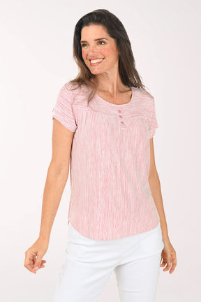Woman wearing a red and white striped shirt on a white background