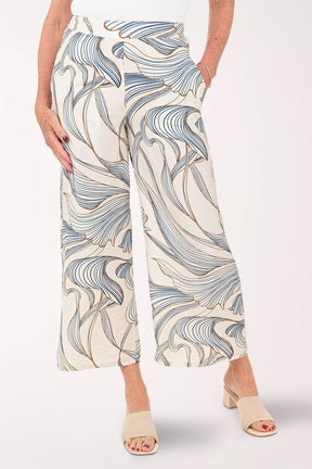 Woman wearing cropped beige pants
