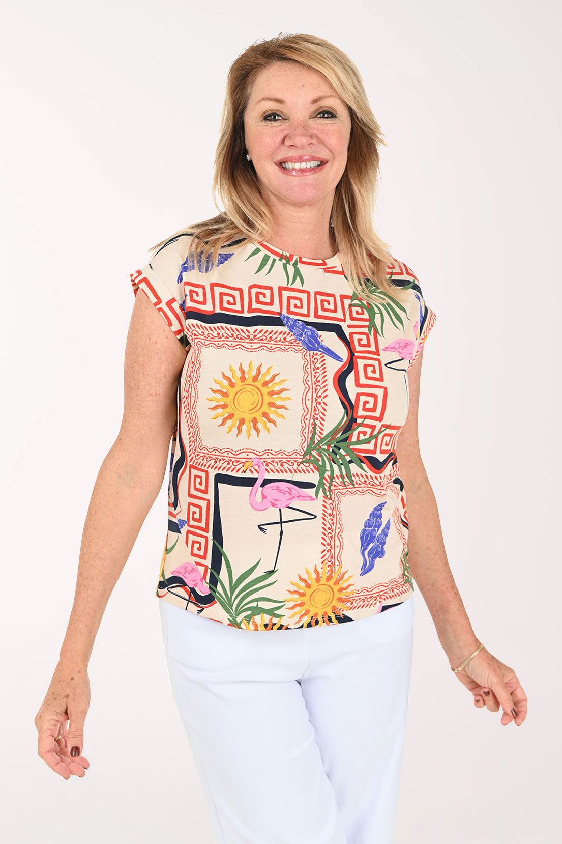 Woman wearing a tropical print short sleeve tee