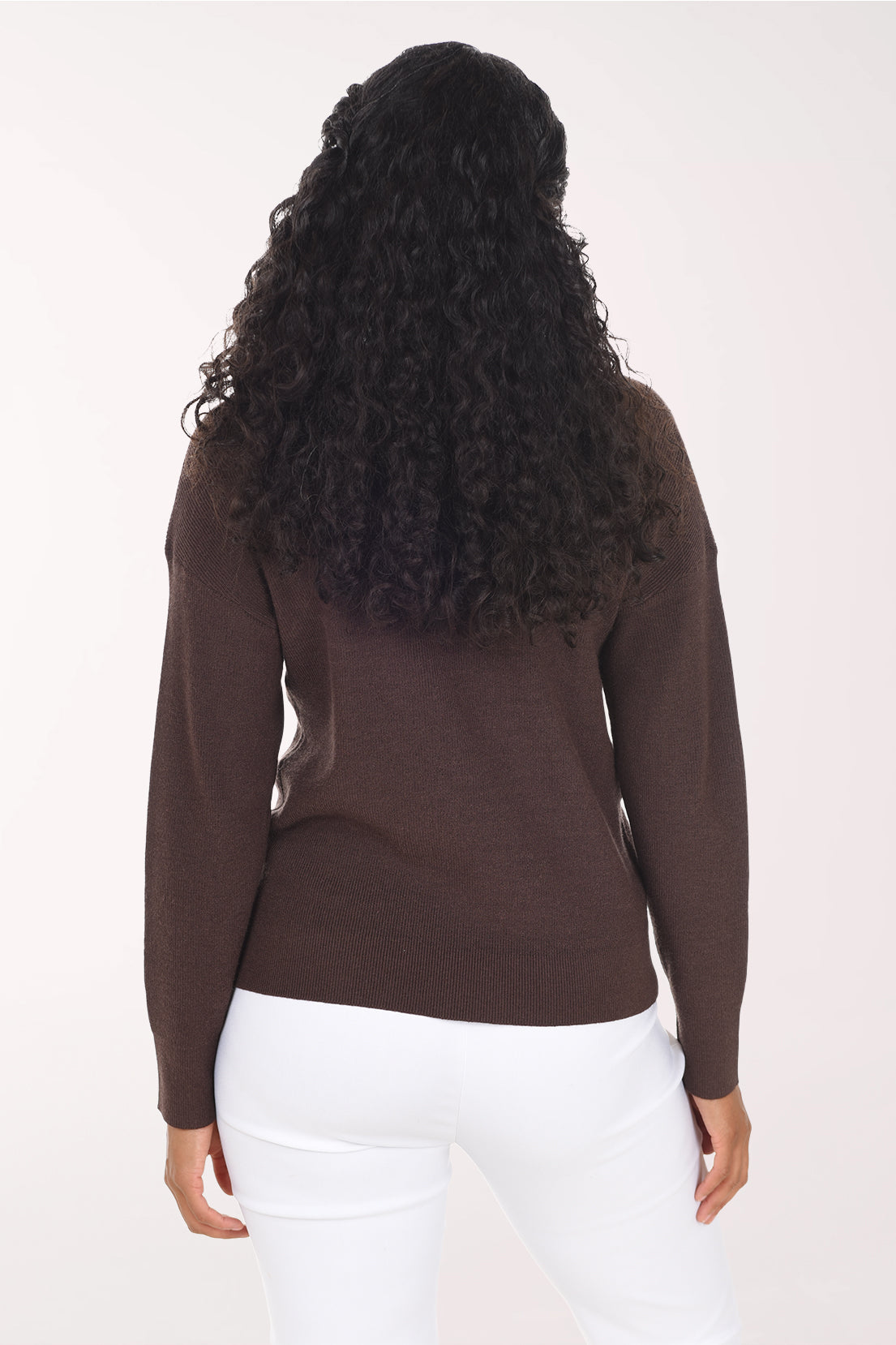 Back view of the plain chocolate brown crewneck sweater with a straight hem.