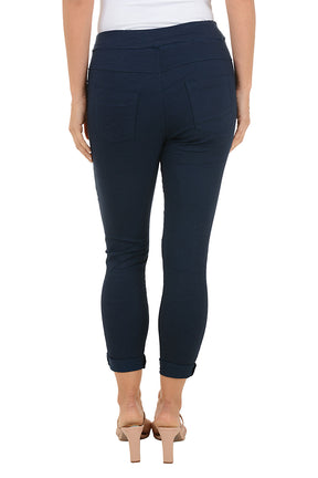 Navy blue pants with palm tree design on a white background. Back shot.