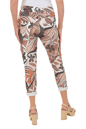 Patterned pants worn by a person on a white background. Back shot.