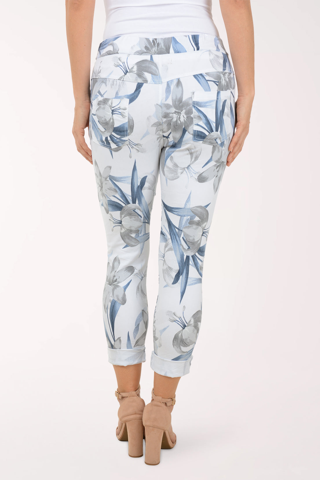 Woman wearing multicolored floral joggers.