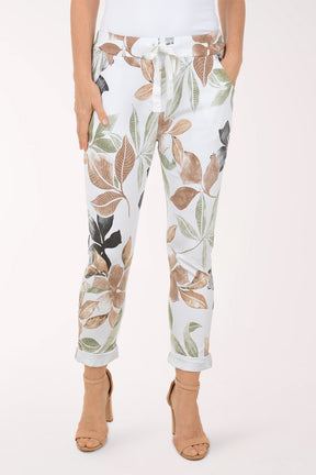 Woman wearing multicolored floral joggers.