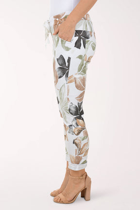Woman wearing multicolored floral joggers.