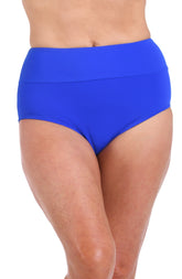 A woman wears a bright blue swim brief against a light colored background