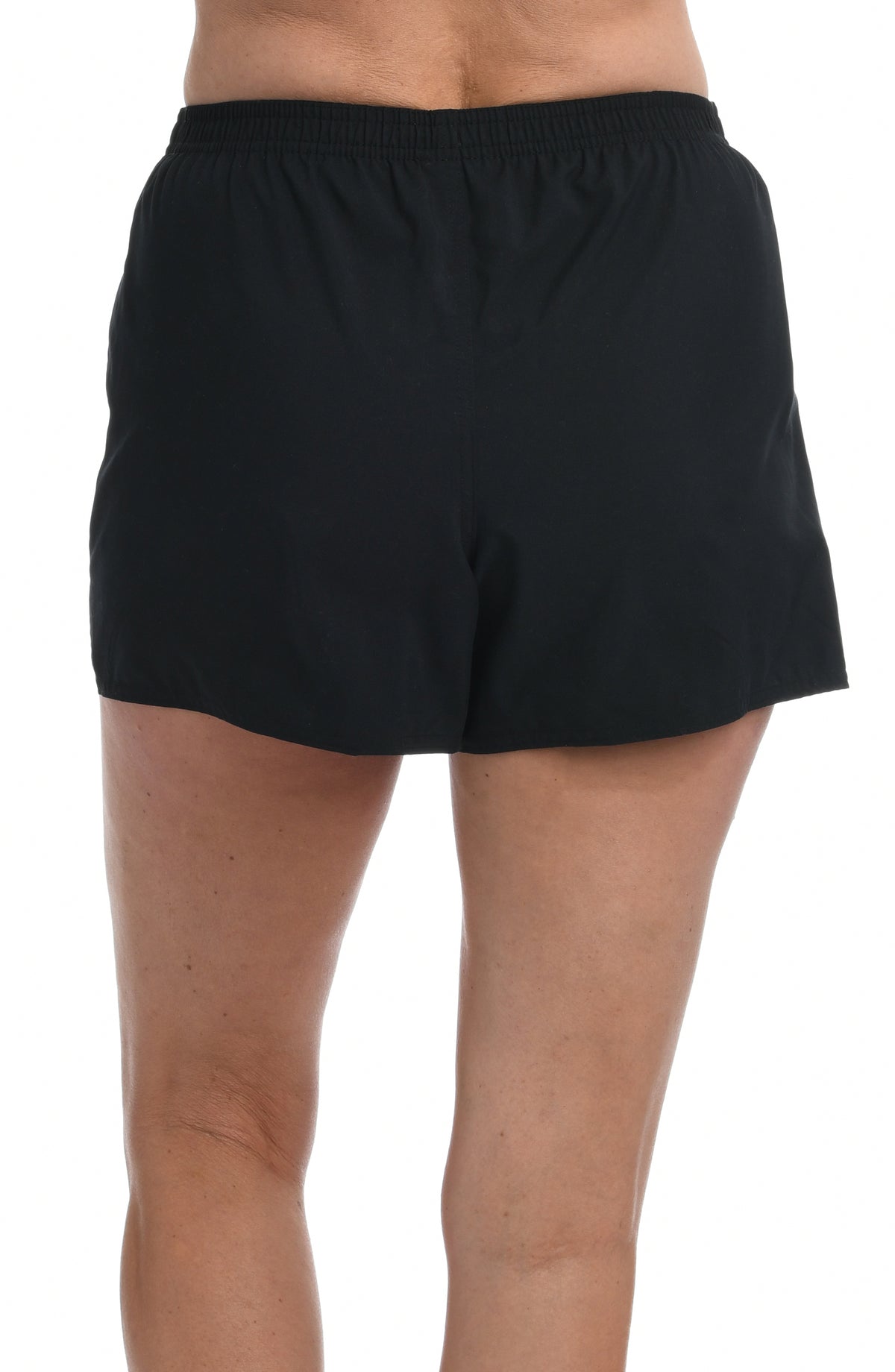 Black woven swim shorts worn by a person on a white background. Back shot.