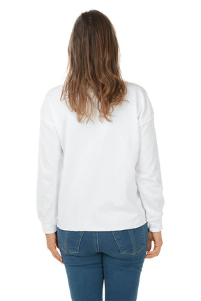 Woman wearing a white sweatshirt with an anchor design on a white background. Back shot.