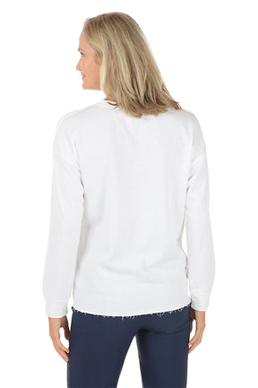 Woman wearing a white sweatshirt with black bird illustrations on a white background. Back shot.