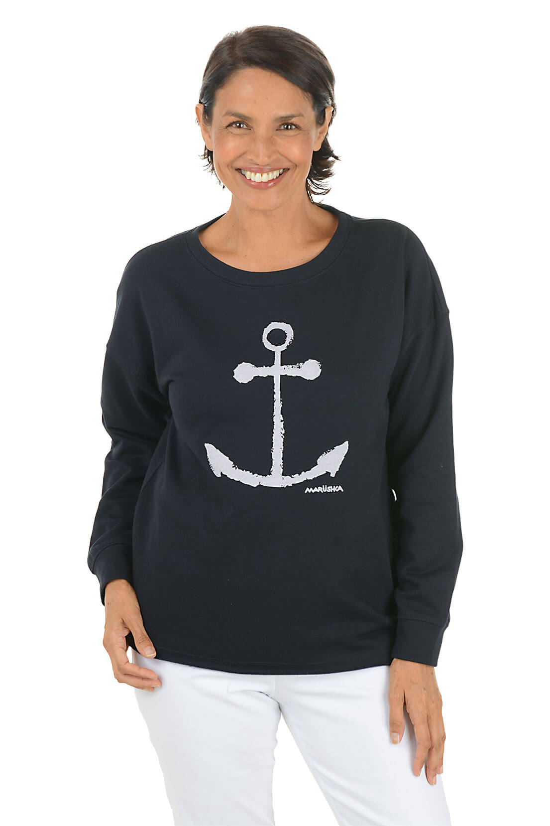 Woman wearing a black sweater with a white anchor design on a white background