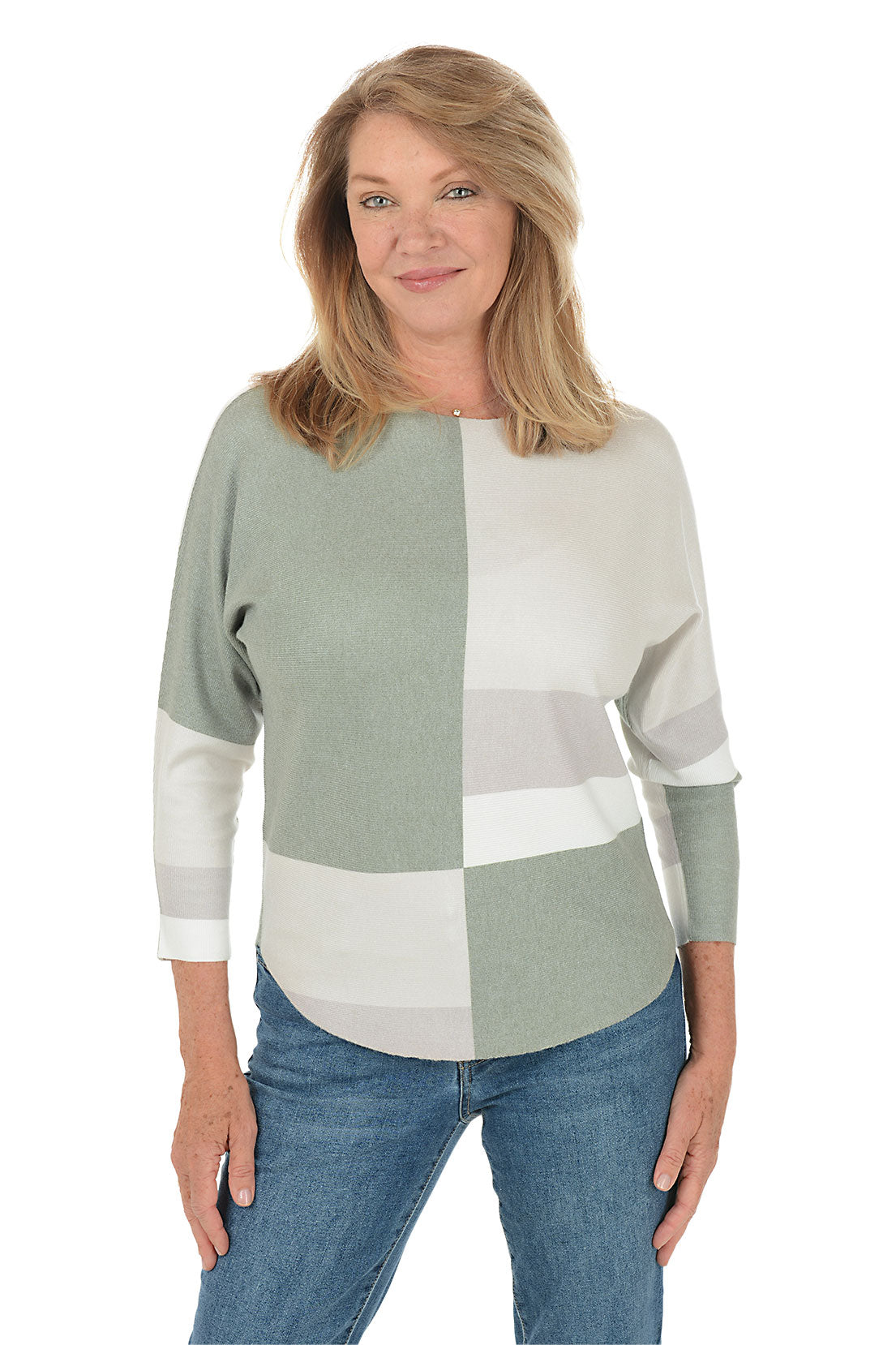 Woman wearing a color-blocked sweater with green and white sections on a white background. Second front shot.