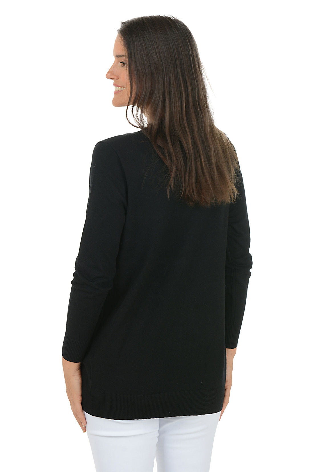 Woman wearing a black cardigan with gold floral designs on a white background. Back shot.