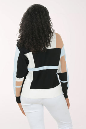 Woman wearing a black and white striped sweater with cut-out sleeves on a white background