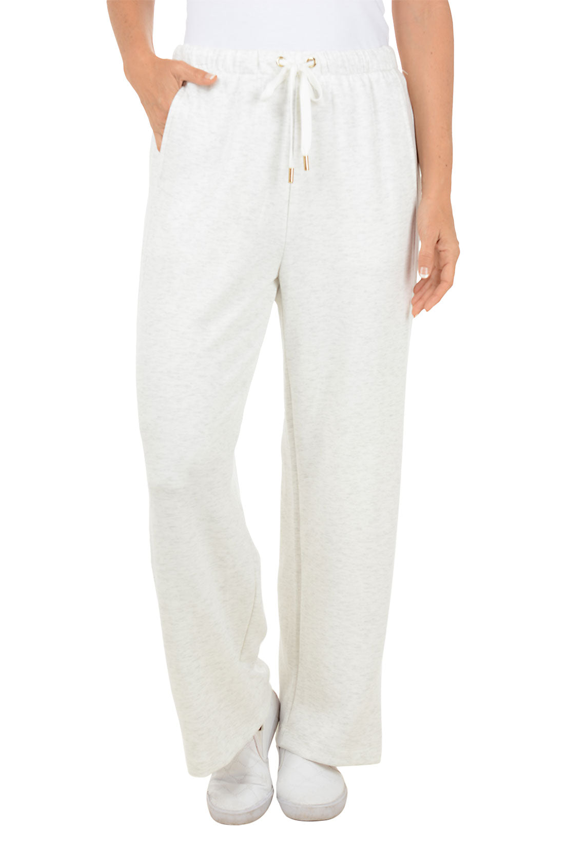 White wide leg sweat pants worn by a person on a white background.