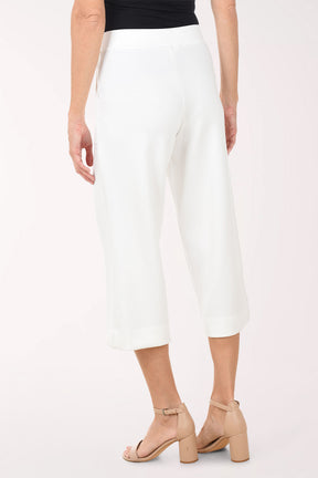White wide-leg pants worn by a person on a white background