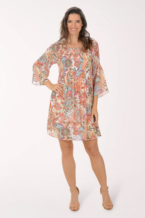Woman wearing a floral dress on a white background
